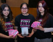Grade 12 students show off the merchandise they are selling to fundraise for GirlKind, an Abbotsford organization focused on raising awareness about gendercide. | Photo by Florence Hwang  