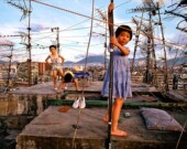 Kowloon Walled City, Children on Rooftop, 1989 | Photo by Greg Girard  