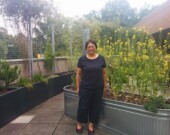 Geok Bin Phua, recipient of the Richmond Arts Award in Volunteerism, in the garden on the rooftop of the Richmond Public Library. | Photo by Naomi Tse