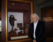 MOA Curator Anthony Shelton in front of David Gomes' artwork in Heaven, Hell and Somewhere In-Between | Photo by Simon Yee  