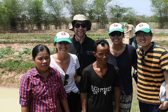 Maricel Saenz, Lawrence Leung, Mr Khon Son and Ms. Nuong Norm with Cambodian farmers.   