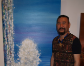 Terry Sasaki poses in front of Splash, one of his latest paintings.| Photo by Simon Yee.  