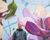 Ilya Viryachev in front of In Bloom: An Ode to Vancouver.| Photo courtesy of Umbrella Pro.  