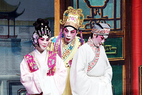 Rosa Cheng (left), Du Quan (middle), Wai Ling Ho (right) during “The Wedding,” the second act of the opera.  
