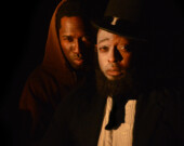 Aadin Church as “Lincoln” and David Lloyd as “Booth” perform in Topdog/Underdog, a play by Suzan-Lori Park. | Photo by David Newham  