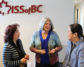 Patricia Woroch with two members of the ISSofBC staff. | Photo courtesy of ISSofBC  