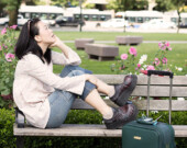 Maki Yi, author and performer of the Suitcase Stories. | Photo by Emily Cooper  