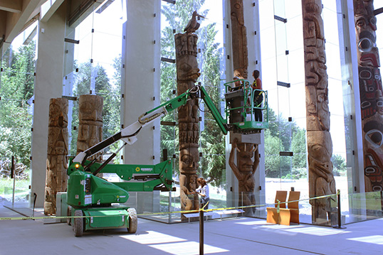 The Eagle Halibut pole by Oyai (Nisga’a), made circa 1860, being inspected by MOA Conservation staff in the summer of 2018 in preparation for the Great Hall seismic upgrades | Photo by Kiel Torres  