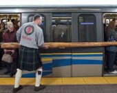 Preparing for Caber Toss.| Photo courtesy of BC Highland Games and Scottish Festival.  