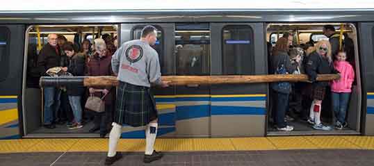 Preparing for Caber Toss.| Photo courtesy of BC Highland Games and Scottish Festival.  