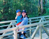 Zhu Guo and her son, Wilson, at Whosainiyak Bridge in Hyde Creek, Port Coquitlam. | Photo by Weiting Guo  