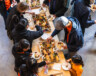 Guests enjoying servings from Tawnshi’s charcuterie boards. — Photo by Devan Francis