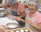 Members of the NNMCC Auxiliary making mochi. &mdash; Photo courtesy of Yoshi Hashimoto