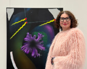 Sofiya Mukhachova with her artwork.| Photo courtesy of Sofiya Mukhachova.   