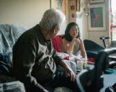 Min Sook Lee and her father (production still). | Credit Elana Emer.  