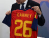 Le capitaine Carney porte le chandail numéro 26. | Photo par La Moncloa - Gobierno de España  