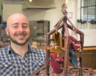 Geoseph Domenichiello with a miniature chocolate Wellington fountain. | Courtesy of The Science of Chocolate.  