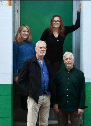 From left to right: Gillian Richards, Gordon Hughes, Joyce Woods and Jean Paul Costaz (photo taken by Oraf, courtesy of Joyce Woods)”  