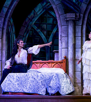 Synthia Yusuf and Kate Besworth in Dracula, a Comedy of Terrors. | Photo by Moonrider Productions for the Arts Club Theatre Company.   